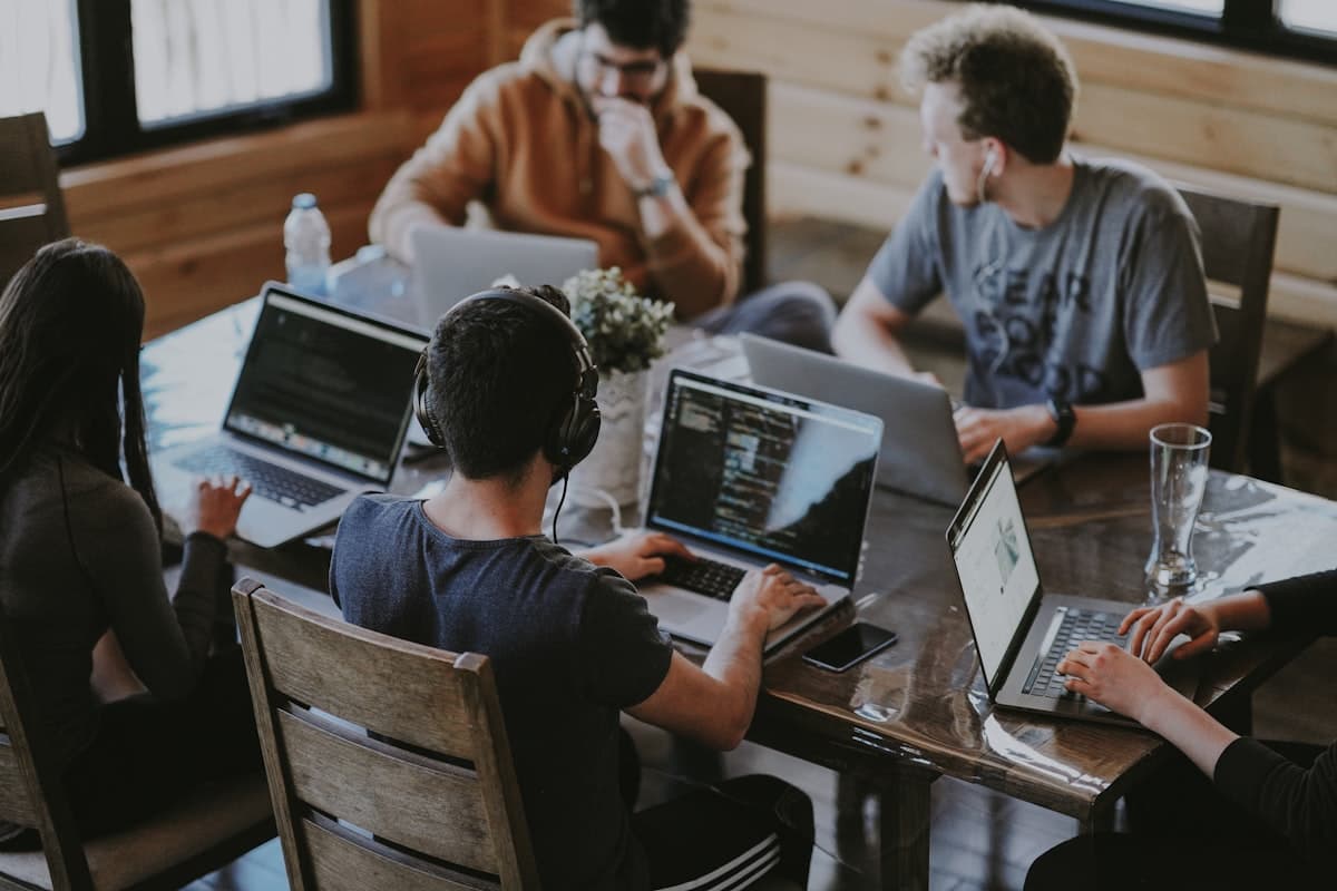 The Host Agency AI team collaborating